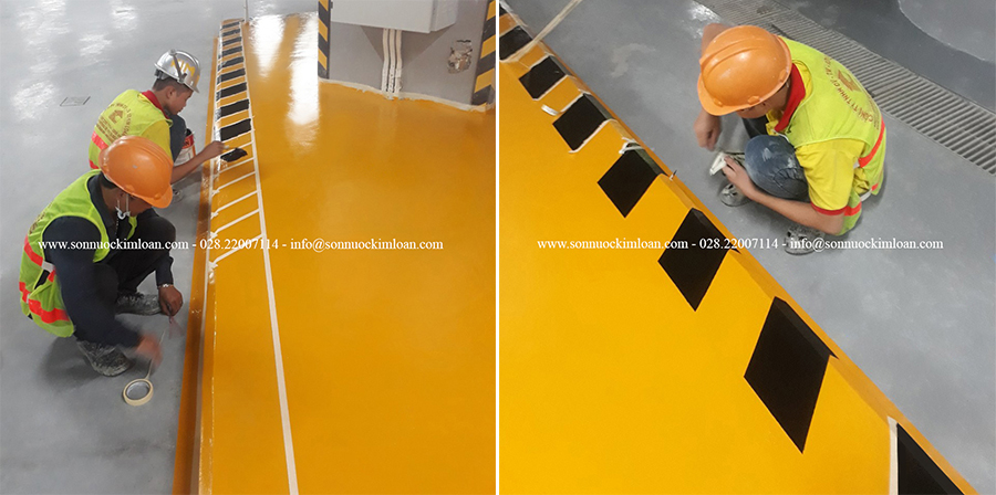 Sơn kẻ sọc vàng đen cho bệ đặt cabin